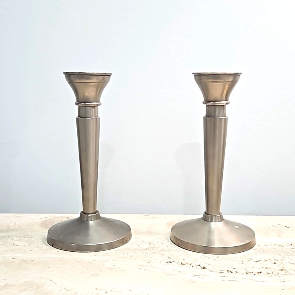 Pair of silver metal candlesticks